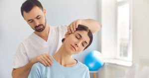 Chiropractor and patient