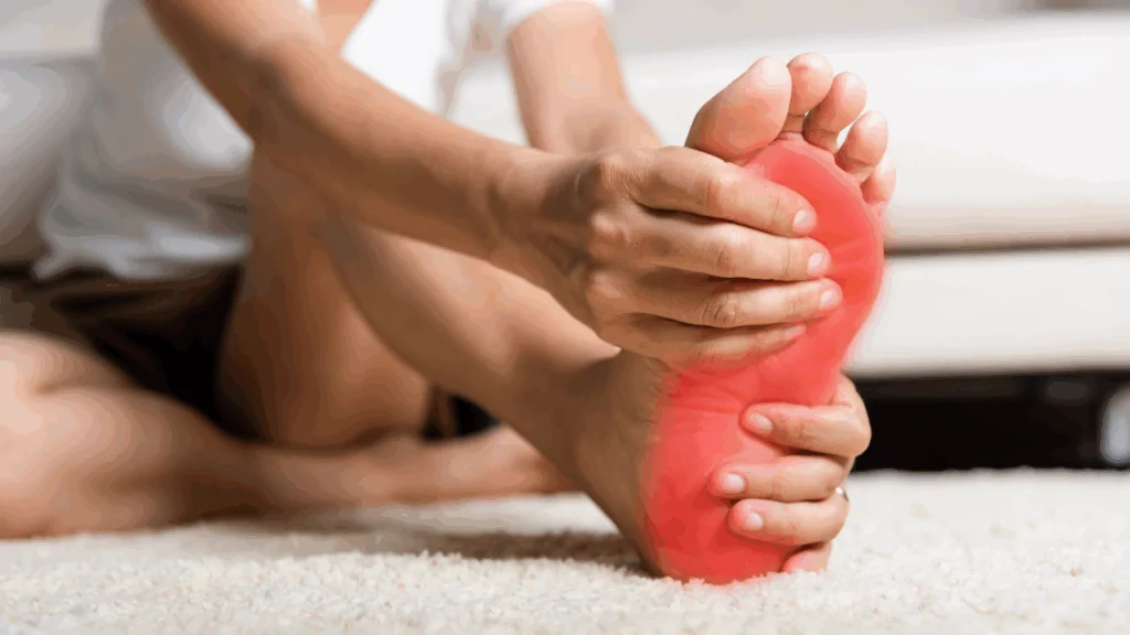 A close-up of a person’s feet with a faint digital overlay of sparkling lights to represent nerve pain and the need for a neuropathy treatment chiropractor at Spine and Joint Center in Fort Lauderdale.