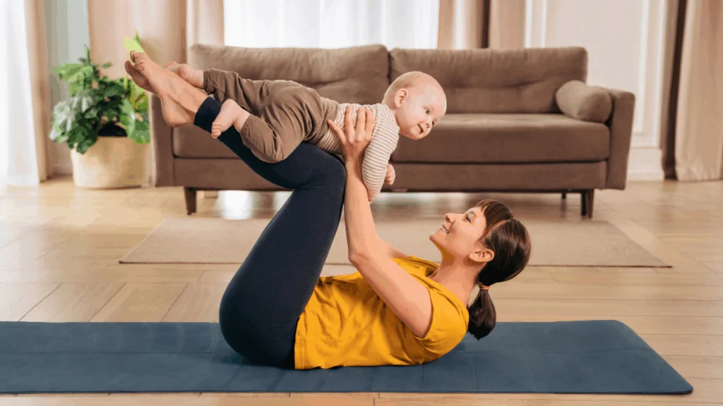 A chiropractor in a blue medical tunic performing a manual pelvic and lower back adjustment on a postpartum patient to facilitate recovery at Spine and Joint Center in Fort Lauderdale.