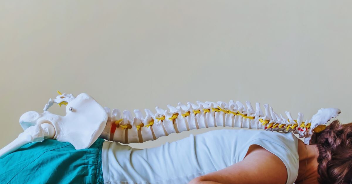 Doctor of Chiropractic performing a spinal adjustment in Fort Lauderdale